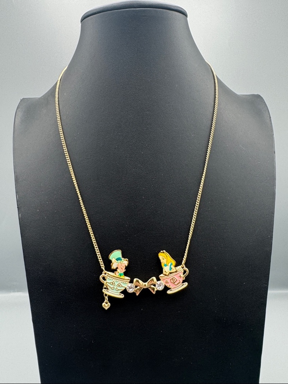 RARE Disney Parks Alice in Wonderland Mad Hatter and Teacups Necklace
Dress Shop